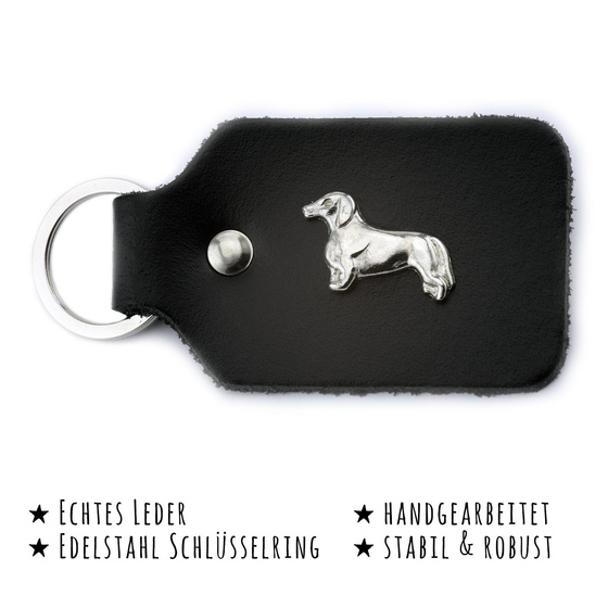 Das Bild mit Beschreibung zeigt ein Dackel Hund aus Leder