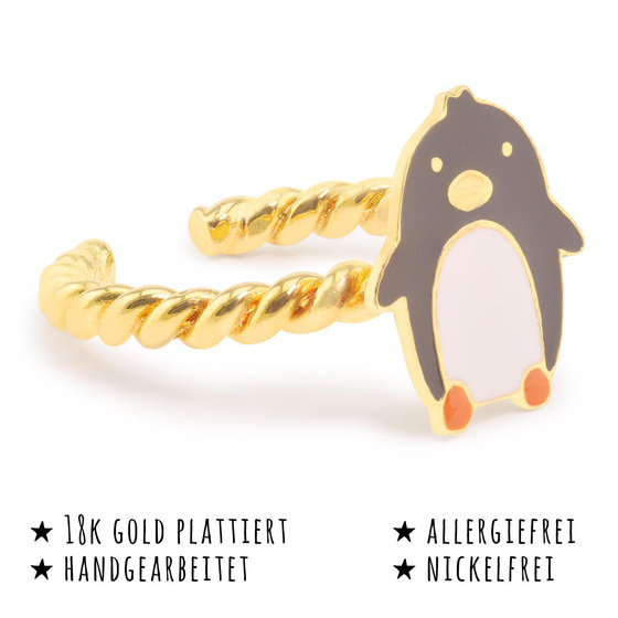 Das Bild mit Beschreibung zeigt ein Damen Ring mit Pinguin aus Messing Gold plattiert mit Emaille handbemalt