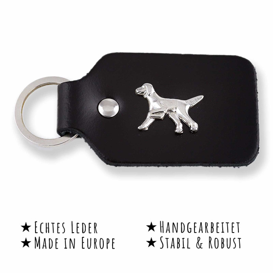 Das Bild mit Beschreibung zeigt ein Irish Setter Hund aus Leder