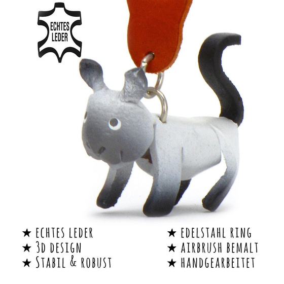 Das Bild mit Beschreibung zeigt eine Katze aus Leder