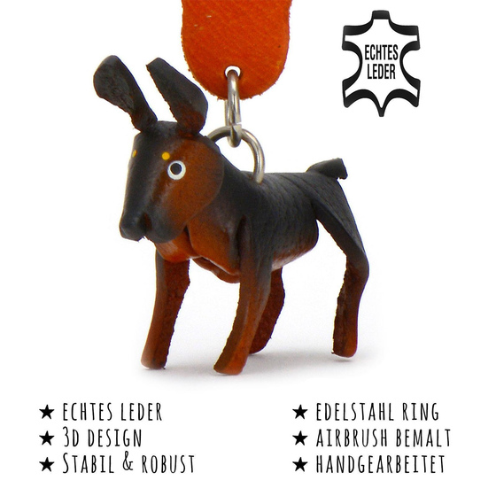 Das Bild mit Beschreibung zeigt ein Dobermann Hund aus Leder