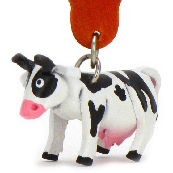 Auf dem Bild zu sehen ist eine Kuh aus Leder als Schlsselanhnger Figur