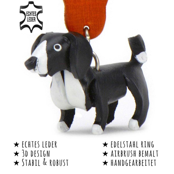Das Bild mit Beschreibung zeigt ein Border Collie Hund aus Leder